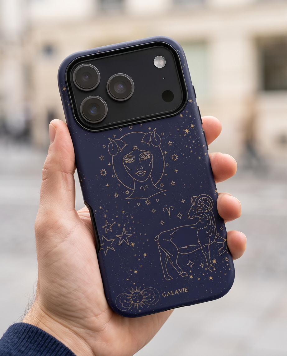 Aries Zodiac Phone Case in Navy held in a hand, lifestyle photo