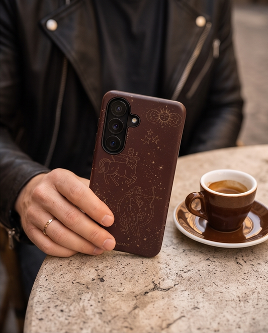 Sagittarius Zodiac Phone Case in Chocolate held in a hand, lifestyle photo